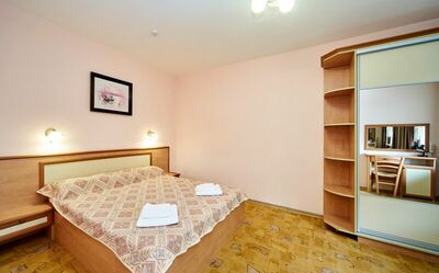 Фотография номера гостиницы Омега-Клуб