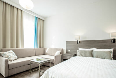 Фотография номера апарт отеля Рамада Новосибирск Жуковка