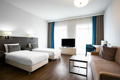 Фотография номера апарт отеля Рамада Новосибирск Жуковка