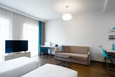 Фотография номера апарт отеля Рамада Новосибирск Жуковка