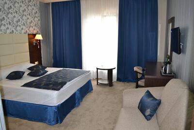 Фотография номера гостиницы Гранд Отель и СПА Майкоп