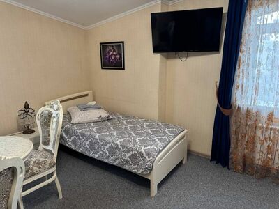 Фотография номера гостиницы Бутик-отель Три Богатыря