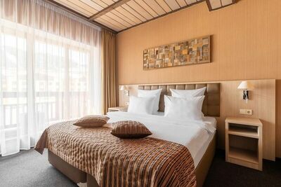 Фотография номера гостиницы Arkhyz Royal Resort & SPA