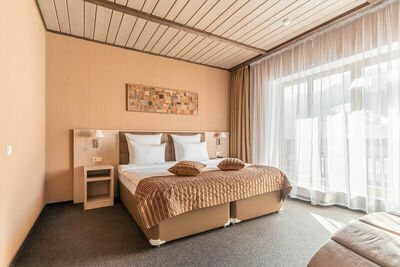 Фотография номера гостиницы Arkhyz Royal Resort & SPA