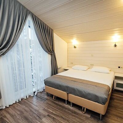 Фотография номера гостиницы Экопарк Поляны