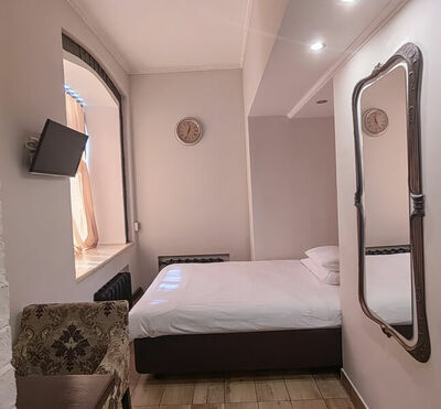 Фотография номера гостиницы Brick Walls