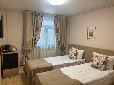 Фотография номера гостиницы Удивительная Деревня Мандроги