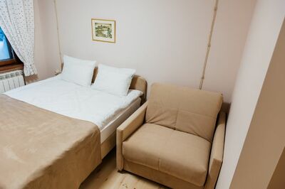 Фотография номера гостиницы Удивительная Деревня Мандроги