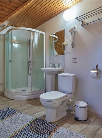 Фотография номера гостиницы Удивительная Деревня Мандроги