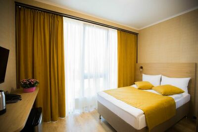 Фотография номера гостиницы Грейс Времена Года