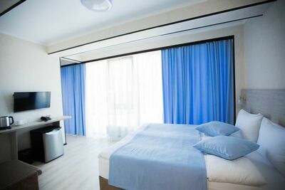 Фотография номера гостиницы Грейс Времена Года