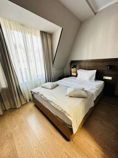 Фотография номера гостиницы Грейс Времена Года