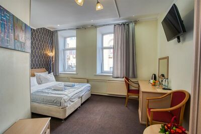 Фотография номера мини отеля Комфорт Москва Садовая-Самотечная