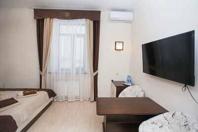 Фотография номера гостиницы Три А