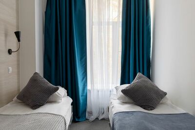 Фотография номера гостиницы Трио