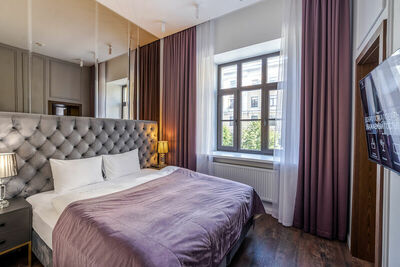 Фотография номера апарт отеля Acqualina