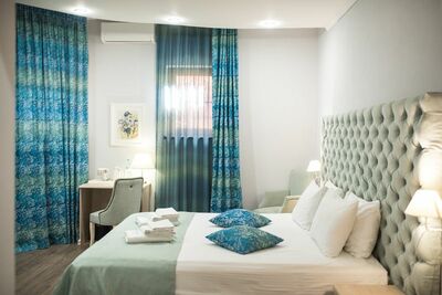 Фотография номера гостиницы Алм Хаус