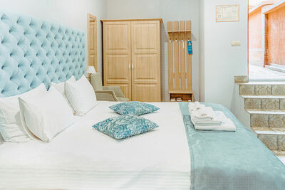 Фотография номера гостиницы Алм Хаус