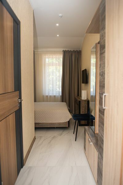 Фотография номера гостевого дома Лес