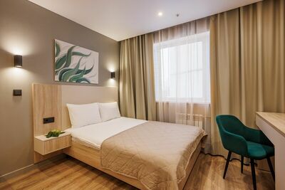 Фотография номера апарт отеля Хеппи Хоум