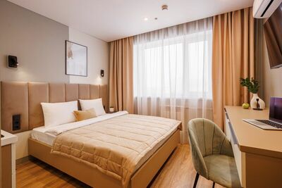 Фотография номера апарт отеля Хеппи Хоум