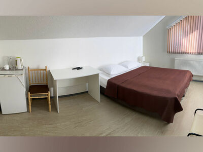 Фотография номера гостиницы Хозяюшка