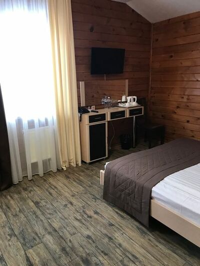 Фотография номера мини отеля Времена года