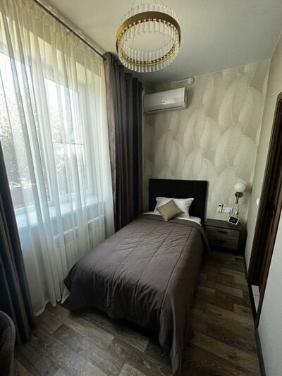 Фотография номера гостевого дома Атмосфера