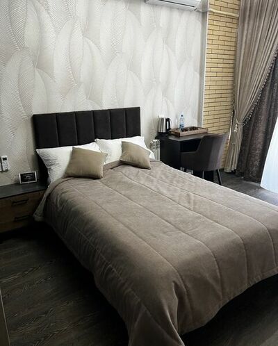 Фотография номера гостевого дома Атмосфера