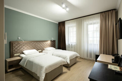 Фотография номера гостиницы Тройка